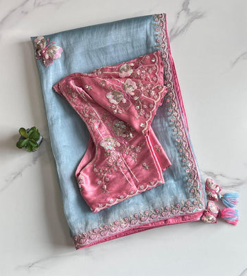 Premium Organza saree with elegant butterflies coding work on all over the sareeScalloped Coding work on either sideContrast piping attached on sareeDesigner Butterfly Tassels as shown Teamed with Designer Stitched blouseFree Size Blouse