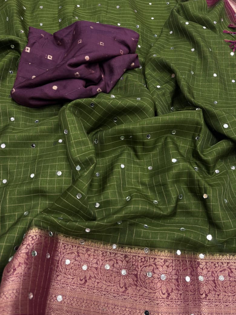 Soft Dola Checks Saree with Mirror Work & Tassels
Dyeble Blouse