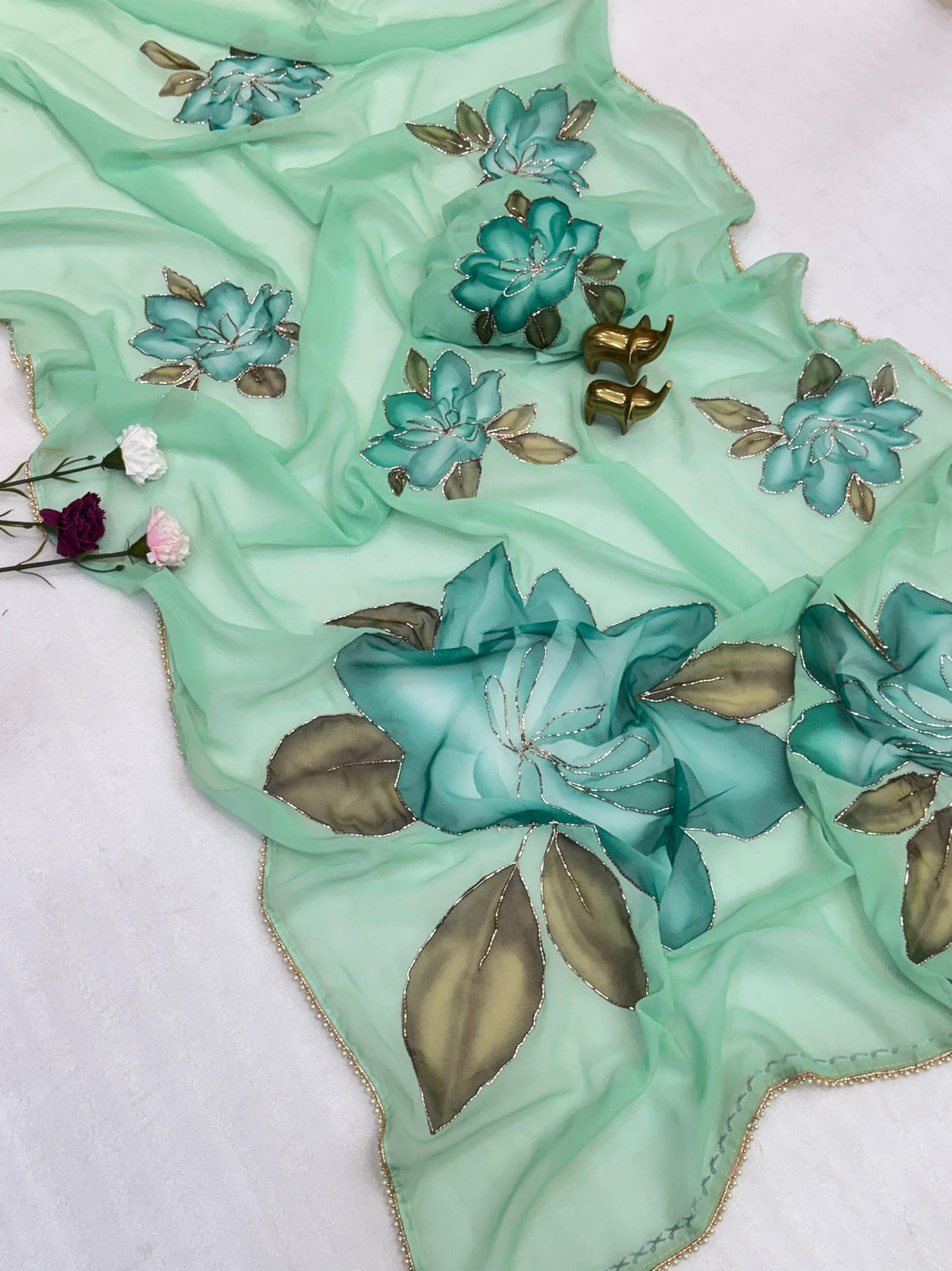 chiffon floral saree with cutwork and lace border
