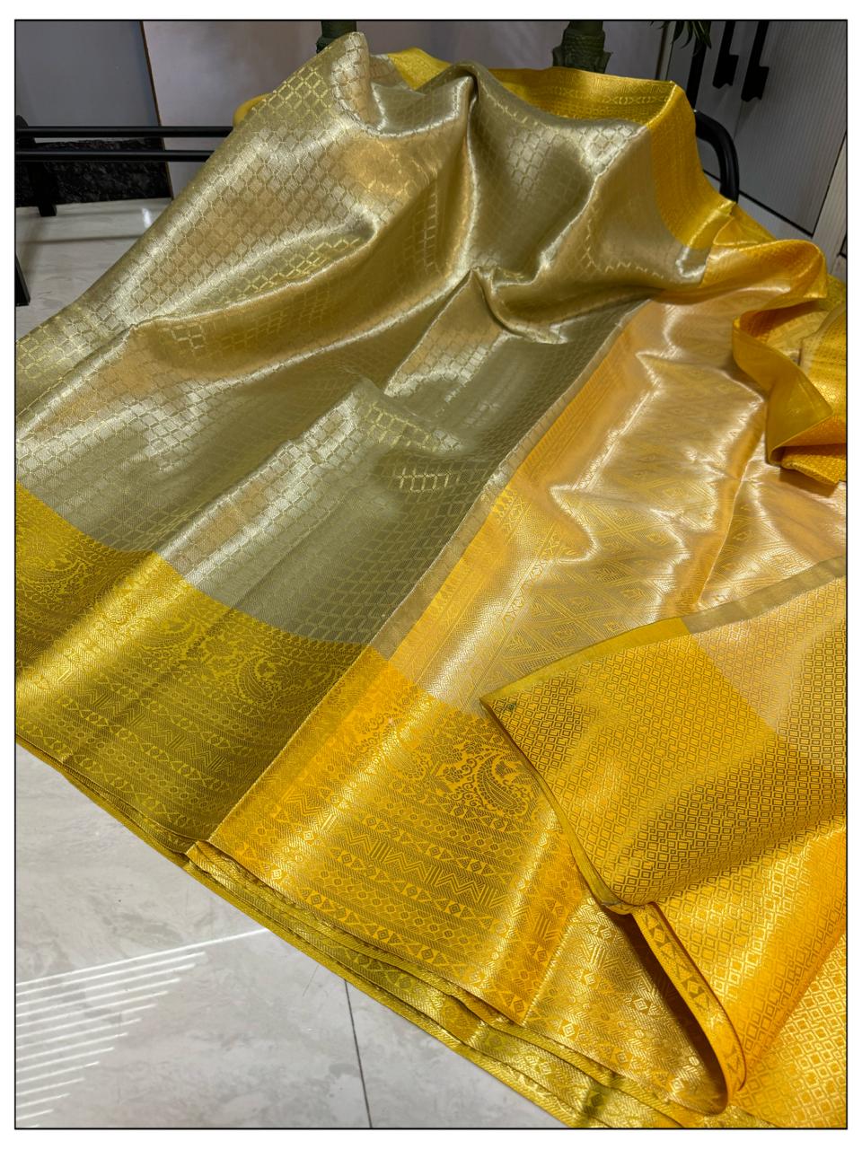Party wear tissue saree with Kanchi border