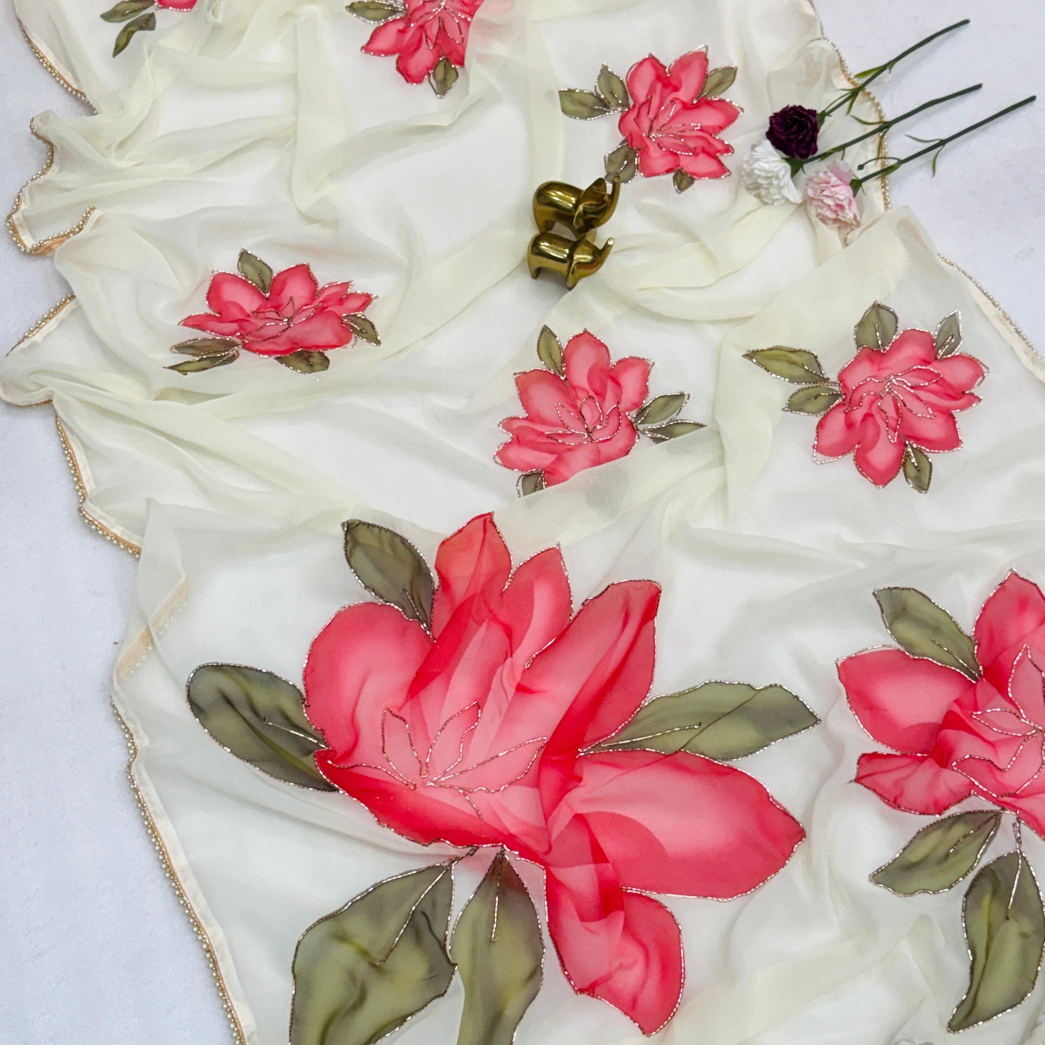 chiffon floral saree with cutwork and lace border